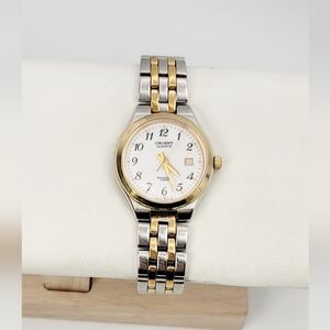 Vintage Orient Swimmer Quartz Two Tone Ladies/Mid-Size Watch SZ0D-P0 CA